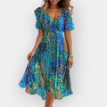 Marje | Midi Dress with Flowing Line