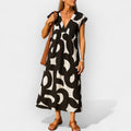 Peeteriina | Airy Dress with V-Neck and Modern Pattern