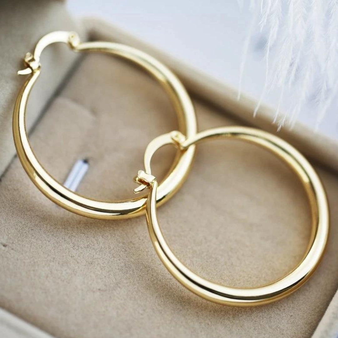 High-impact gold earrings