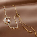 Bracelet with Moon Pendant in Zirconium and Gold
