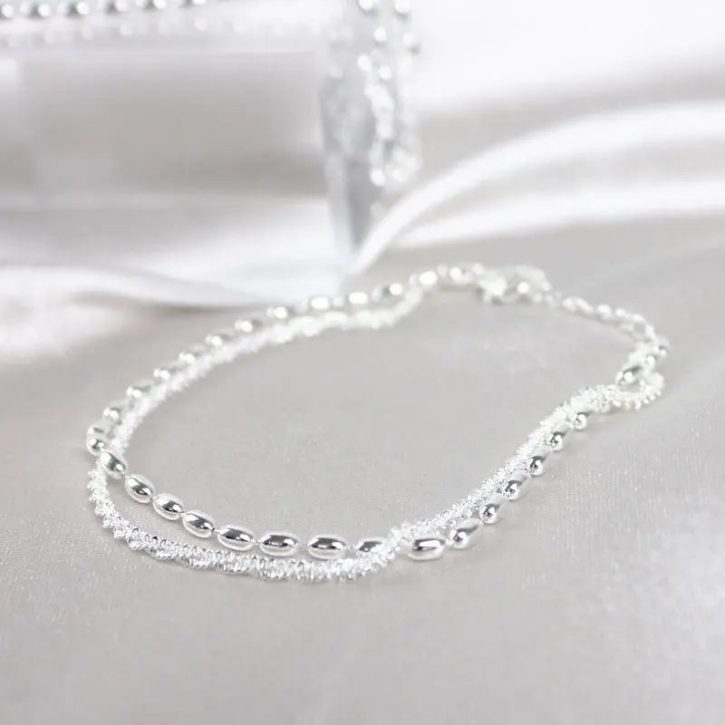 Elegant Silver Bracelet Set with Zirconium Stones
