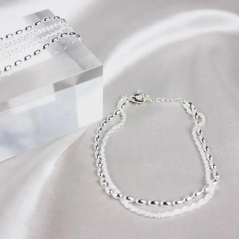 Elegant Silver Bracelet Set with Zirconium Stones