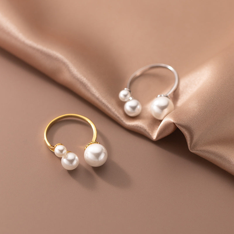 Elegant Ring with Trio of Pearls