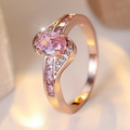 Gold ring with pink crystal