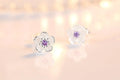 Flower-shaped stud earrings with zirconia