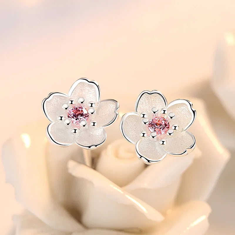 Flower-shaped button earrings with zirconia