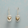 Heart-shaped silver and gold earrings