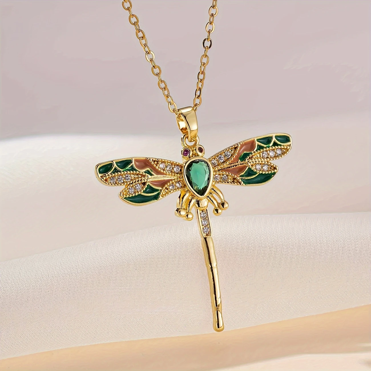 Glow-in-the-dark necklace with green dragonfly