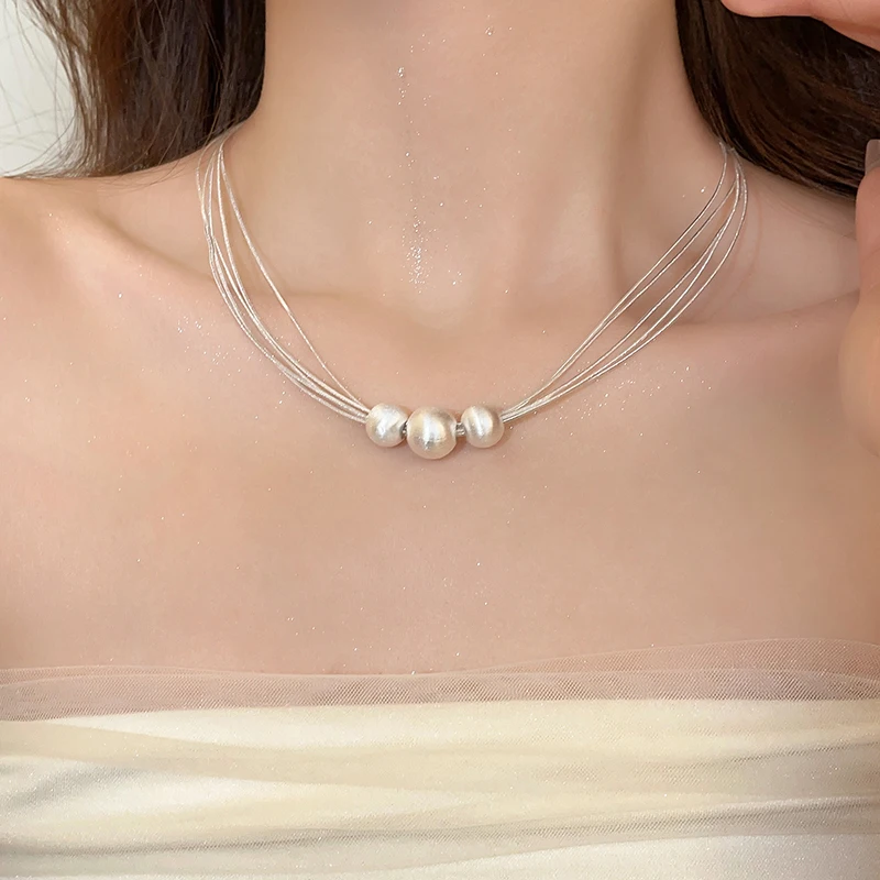 Elegant Layered Necklace with White Pearls