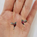 Wire earrings with gold hummingbird and crystals